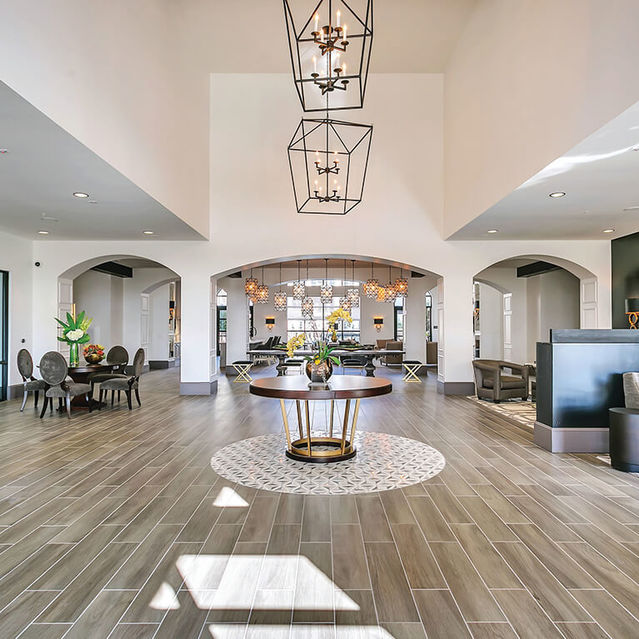 Front entrance at The Huntington Apartments in Plano, TX