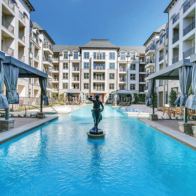 Resort style pool at The Huntington Apartments in Plano, TX
